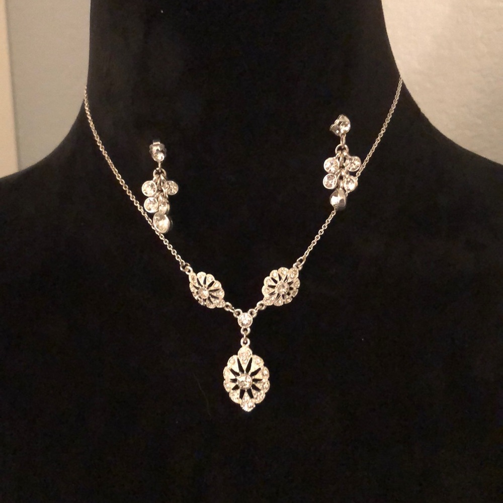 Silver tone necklace and earrings set